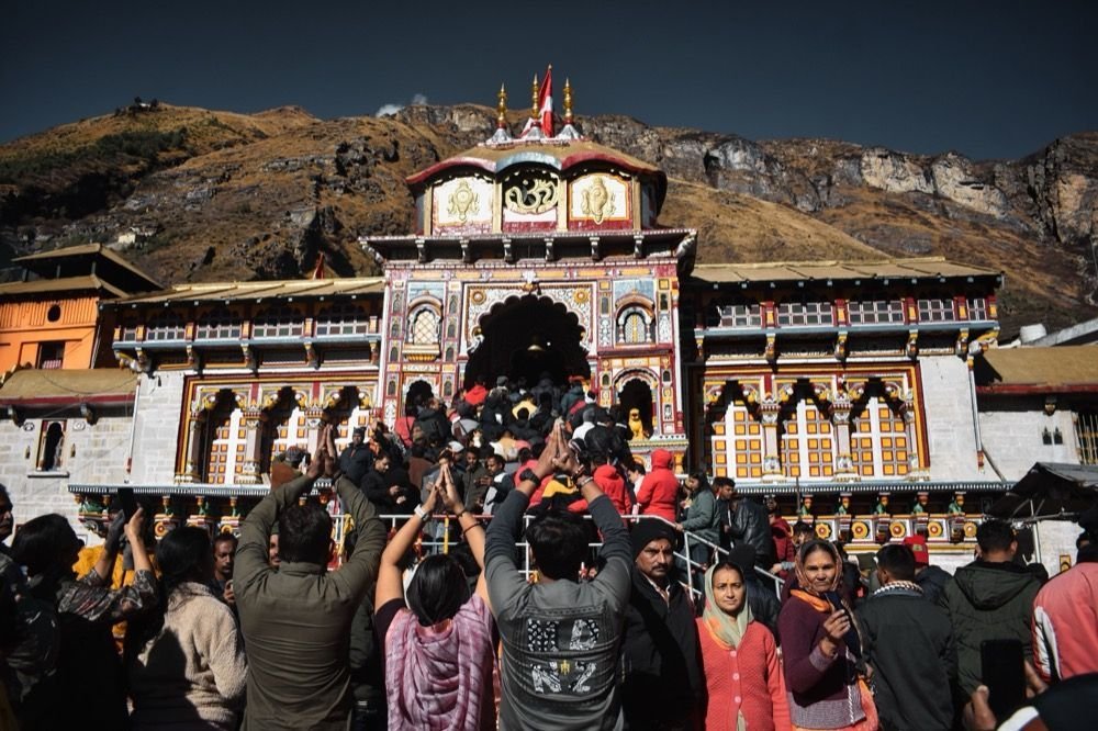 Pilgrims offering namaste at Badrinath temple during Char Dham Yatra