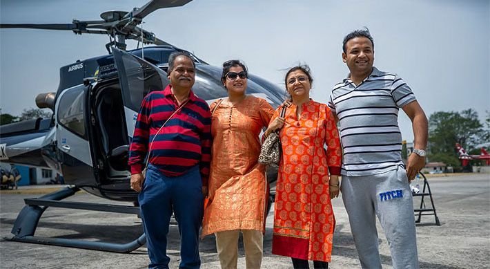 Char Dham Yatra guests beside an Airbus helicopter
